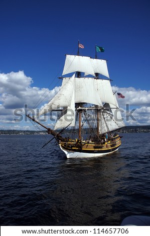 KIRKLAND, WASHINGTON - AUG 31:The wooden brig, Lady Washington, sails on Lake Washington    during a mock sea battle as part of Labor Day festivities on Aug 31, 2012 near Kirkland , Washington.