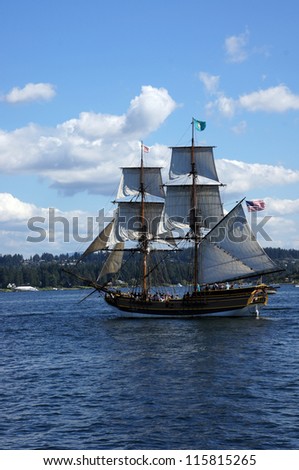 KIRKLAND, WASHINGTON - AUG 31 - The wooden brig, Lady Washington, sails on Lake Washington  during a mock sea battle as part of Labor Day festivities on Aug 31, 2012 near Kirkland , Washington.