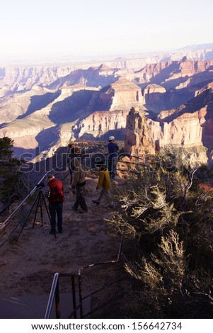 GRAND CANYON, ARIZONA - SEP 27 - Photographers and tourists get their last images at the North Rim before the government shutdown,  on Sep 27, 2013 at the Grand Canyon National Park, Arizona