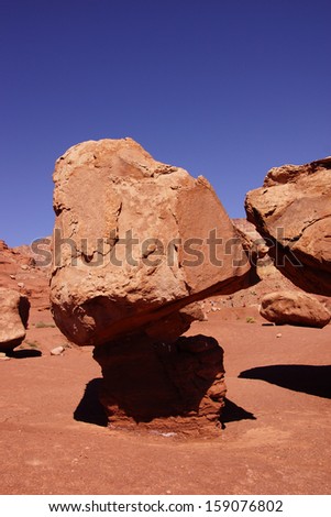 Balancing rock on tiny pedestal,  in the desert highlands  near Marble Canyon,Arizona