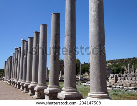 Doric marble columns of the agora  in the ancient Greek city of  Perge,  Turkey