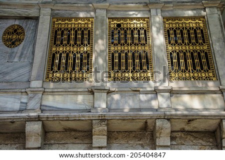 Golden grillwork on exterior wall  of the Topkapi Palace in Istanbul, Turkey
