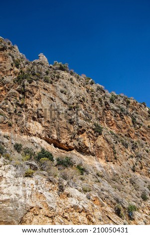 Rugged island mountain landscape   from the coastal highway near Xantos,  Turkey