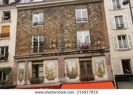 PARIS - OCT 4, 2011 - Renaissance frescoes decorate the building on the Rue Mouffetard, Paris, France