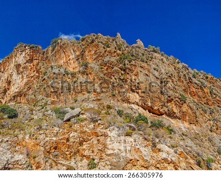 Rugged island mountain landscape   from the coastal highway near Xantos,  Turkey
