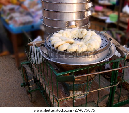 Steamed hombow dim sum ready to eat  at the street market in Kyaukme Myanmar (Burma)