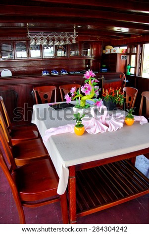 MEKONG RIVER, VIETNAM - FEB 6, 2015 - \
Dining room deck on small cruise ship,  Mekong River delta,  Vietnam
