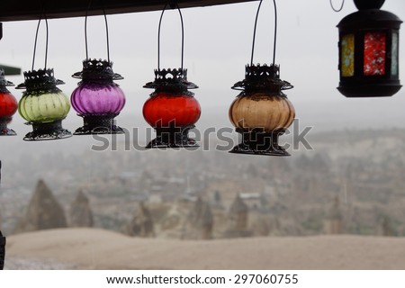 Brightly colored glass lanterns on a rainy day in  Cappadocia, Turkey