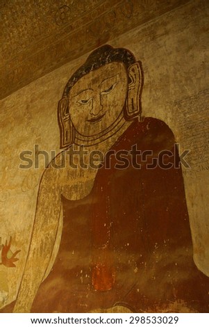 Ancient fresco painting of Buddha in Bhumiparsa Mudra position, Calling the Earth To Witness the Truth, Htilominlo Temple, Bagan,  Myanmar (Burma)