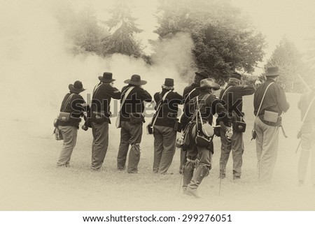 Union infantry line firing a volley,  Civil War Battle Re-enactment,  on Jun 20, 2009 in Port Gamble, WA.