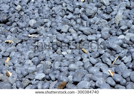 Cobbles, smooth and rounded, form patterns on the beach, Cobble Beach, Yaquina Head,  Oregon Coast