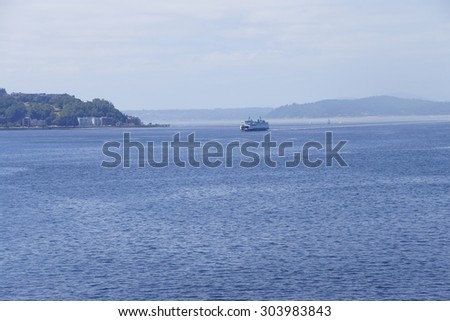 Washington State ferry crosses Puget Sound and nears  Seattle, Washington