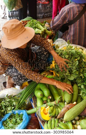 Selling green vegetables, bananas and banana flower pod  in the old Market of  Siemn Reap,  Cambodia