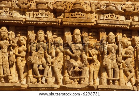 Sandstone carvings, kings and apsaras, ancient city of		Chittorgarh,	India