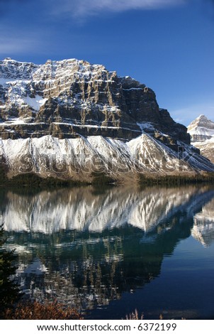 Bow Lake and striated mountain, 	Rocky Mountains,	Columbia Icefield Parkway,	Alberta, Canada