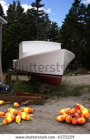 Lobster boat and buoys, orange & yellow,			Mount Desert Island, Acadia National park, Maine, New England