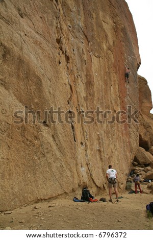 Belayers and climber on rock face,		Smith Rock State Park, 	Central Oregon