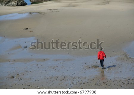 Walking on the beach at low tide, red parka,	Agate Beach, 	Newport, 	Oregon coast