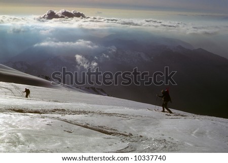 Telemark skiers on ascent of Mt Baker, near sunset,		Cascades	Washington
