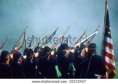 Union line preparing to volley fire,		Civil War battle reenactment