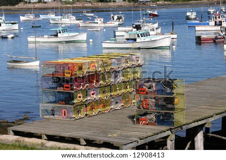 Brightly colored lobster traps and harbor view,	Mount Desert Island, Acadia National Park,	Bernard 	Maine