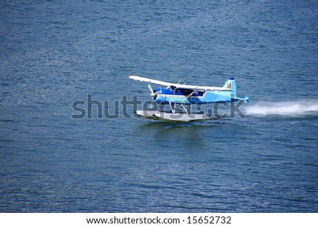 Float plane, taking off from water,		Juneau,	Alaska