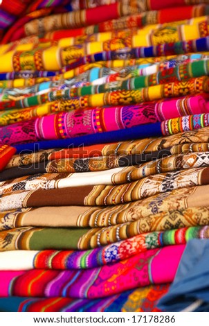 Colorful handmade blankets& tablecloths,	Pisac market, 	Cusco,	Peru, South America