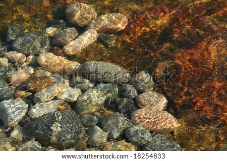 Low tide ripples, granite pebbles, rounded by the ocean	Acadia National Park, Mount Desert Island ,	Seawall	Maine