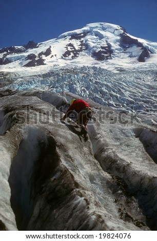 Ice Climber on icefall below Mt Baker volcano,		Cascades	Washington