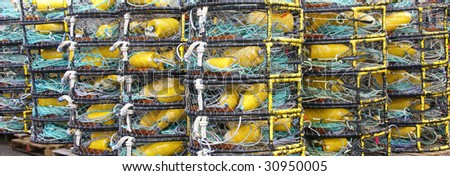 Yellow and blue crab floats, and crab traps, drying on wharf,  Newport, Oregon Coast