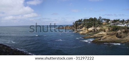 Rocky coast and beach with ocean surf,    Oregon Coast