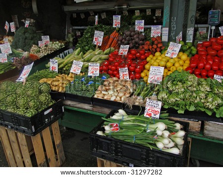 Fresh vegetables on display at farmer's market,  Pike Place Market,   Seattle, Pacific Northwest