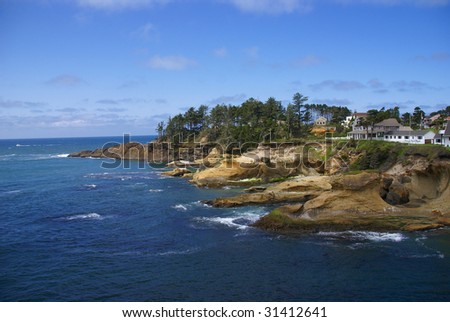 Rocky coast and beach with ocean surf,    Oregon Coast