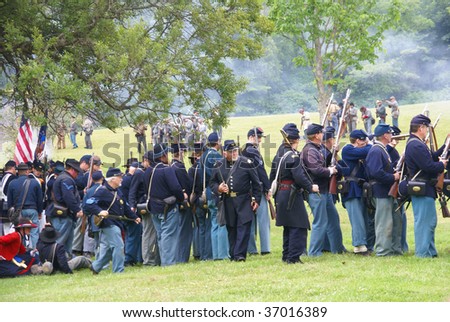 PORT GAMBLE, WA - JUNE 20 : Union and Confederate Civil War reenactors skirmish in a mock battle June 20, 2009 in Port Gamble, WA.