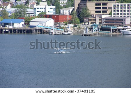 Float plane, taking off from water,  Juneau, Alaska