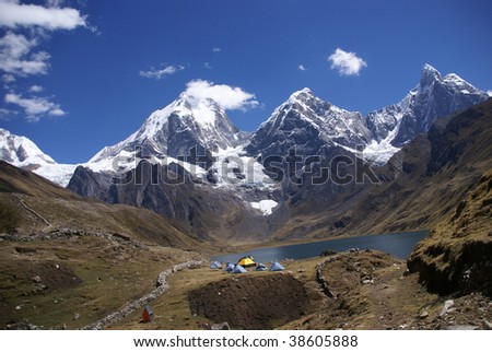 Trekking camp with pack mules and donkeys, Carhuacocha Lake,   Andes, Peru, South America