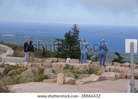 Tourists on top of Cadillac Mountain looking over Bar Harbor,   Cadillac Mountain, Mount Desert Island, Acadia National park, Maine, New England