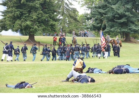 PORT GAMBLE, WA - JUNE 20 : Union infantry hold their line as casualties increase during a mock Civil War battle on June 20, 2009 in Port Gamble, WA.