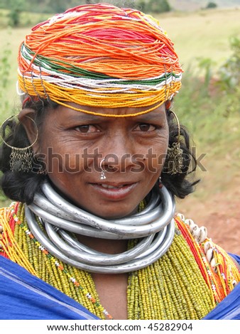 ORISSA INDIA - NOV 12 - Bonda tribal woman poses for a portrait on her way to the  weekly market on Nov 12, 2009 in Ankadeli, Orissa in India