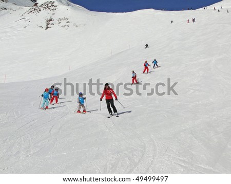 PORTES DU SOLEIL, SWITZERLAND - FEB 28 :  French children learn to ski near Les Crosets  on Feb 28, 2010 in Portes du Soleil, Switzerland