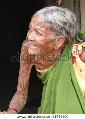 ORISSA,  INDIA - Nov 13 - Old woman in a tribal village poses for her portrait 		on Nov 13, 2009, in Orissa, India