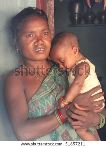 ORISSA,  INDIA - Nov 13 - Tribal woman and her young child on Nov 13, 2009, in Orissa, India