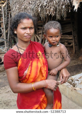 ORISSA,  INDIA - Nov 13 - Tribal woman and her young child   on Nov 13, 2009, in Orissa, India