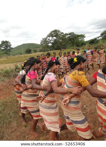 ORISSA,  INDIA - NOV 12 : Tribal women link arms for Gdaba harvest dance on Nov 12, 2009, in Lamptaput, Orissa, India