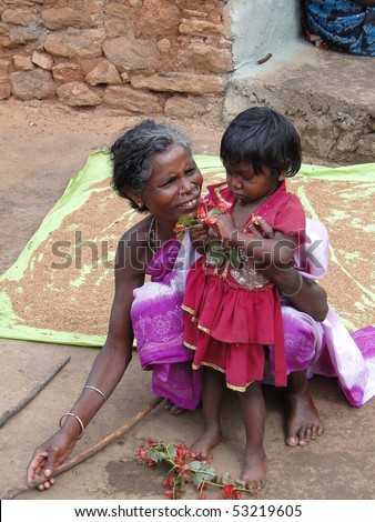 ORISSA,  INDIA - Nov 13 - Tribal woman and her young child on Nov 13, 2009, in Orissa, India