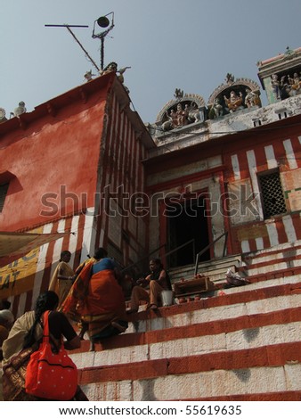 VARANASI, INDIA - NOV 7 - Pilgrims climb the steps to the Shiva Temple of Kedara Ghat on Nov 7, 2009, in Varanasi, India.