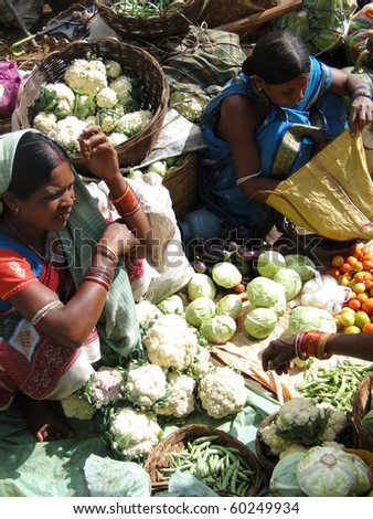 ORISSA, INDIA - NOV 13:Tribal women sell fresh vegetables  on Nov 13, 2009, in  Orissa, India
