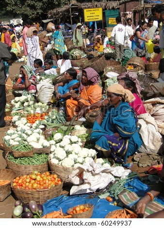 ORISSA, INDIA - NOV 13:Tribal women sell fresh vegetables  on Nov 13, 2009, in Orissa, India