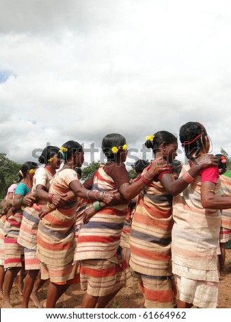 ORISSA,  INDIA - NOV 12 :Tribal women link arms for Gdaba harvest dance on Nov 12, 2009, in Lamptaput, Orissa, India