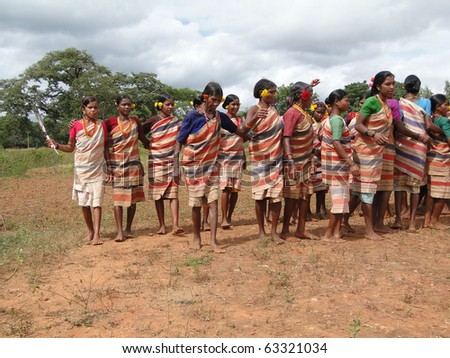ORISSA,  INDIA - NOV 12 - Tribal women link arms for Gdaba harvest dance on Nov 12, 2009, in Lamptaput, Orissa, India